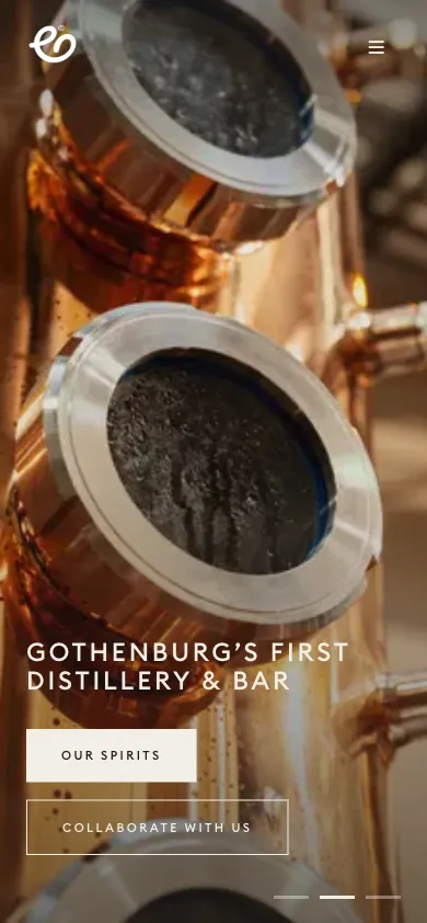 Ego Distillers home page on a phone: a close-up of a copper still behind the client’s headline, with Our spirits and Collaborate with us buttons