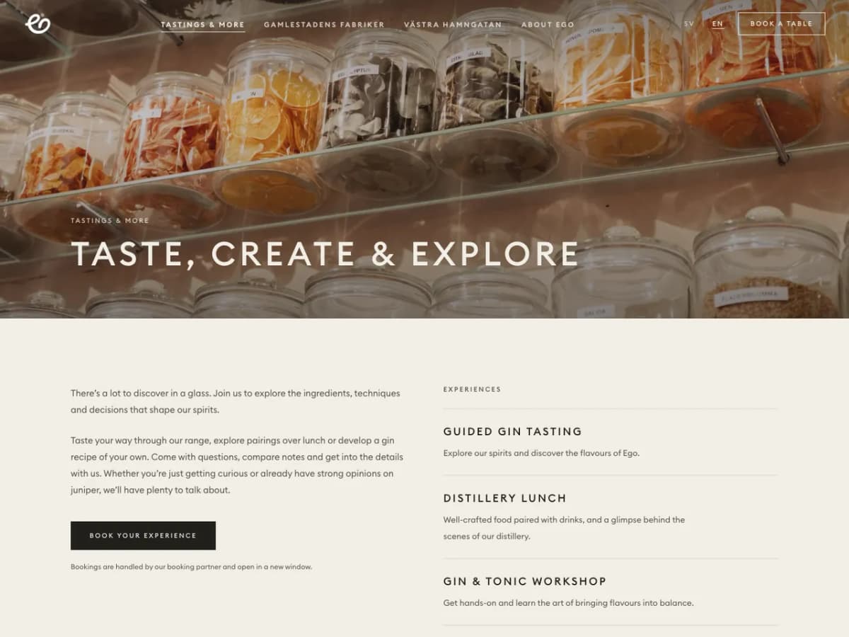 Tastings & More page on desktop: jars of dried botanicals behind the headline Taste, create & explore, with the experiences listed beside a Book your experience button